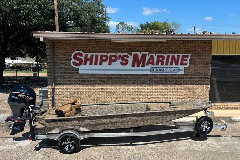 Slide: The Image of 2026 Xpress X18DB boat on trailer at Shipp's Marine dealership. - 6