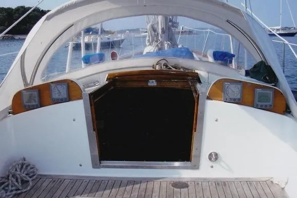 Slide: The Image of Cockpit of 1971 Nautor Swan 43 Sloop with navigation instruments and wooden hatch. - 11