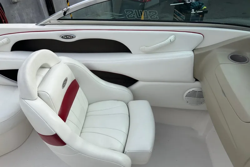 Slide: The Image of Interior of 2000 Chaparral 216 SSi boat with white and red seating. - 10