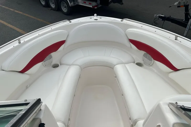 Slide: The Image of Interior of 2000 Chaparral 216 SSi boat with white and red seating. - 11