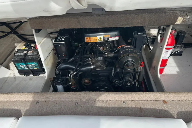 Slide: The Image of 2000 Chaparral 216 SSi boat with extended swim platform at outdoor display. - 18