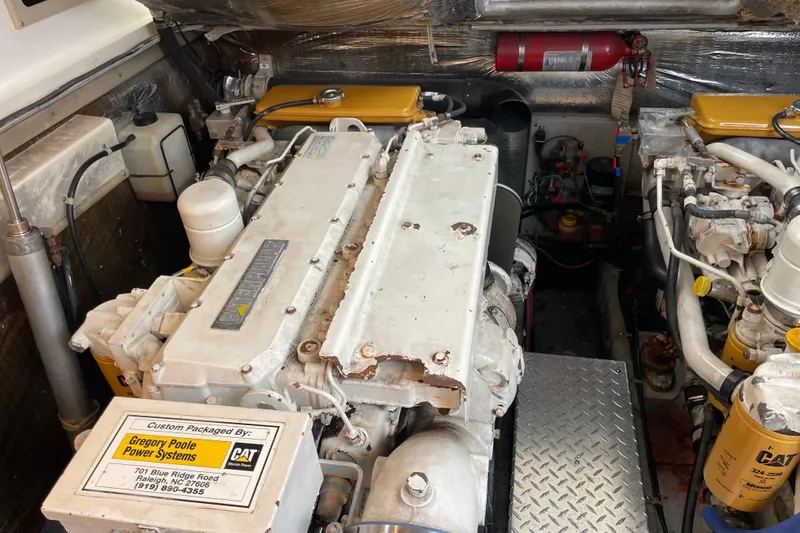 Slide: The Image of Engine room of a 1999 Albemarle 30 boat with CAT marine power systems. - 26