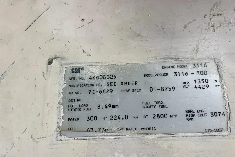 Slide: The Image of CAT engine specification plate for Albemarle 30, 1999 model, showing technical details. - 29