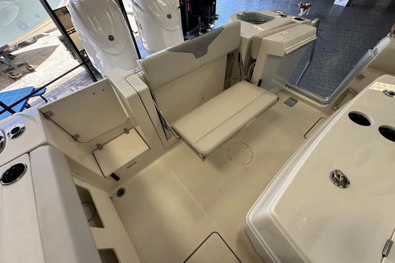 Slide: The Image of 2026 Sailfish 272 CC boat interior with seating and storage compartments. - 5