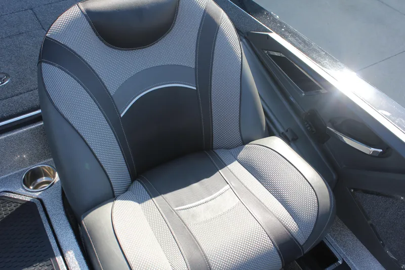 Slide: The Image of 2020 Ranger Z520L boat seat with gray and black upholstery, cup holder visible. - 11