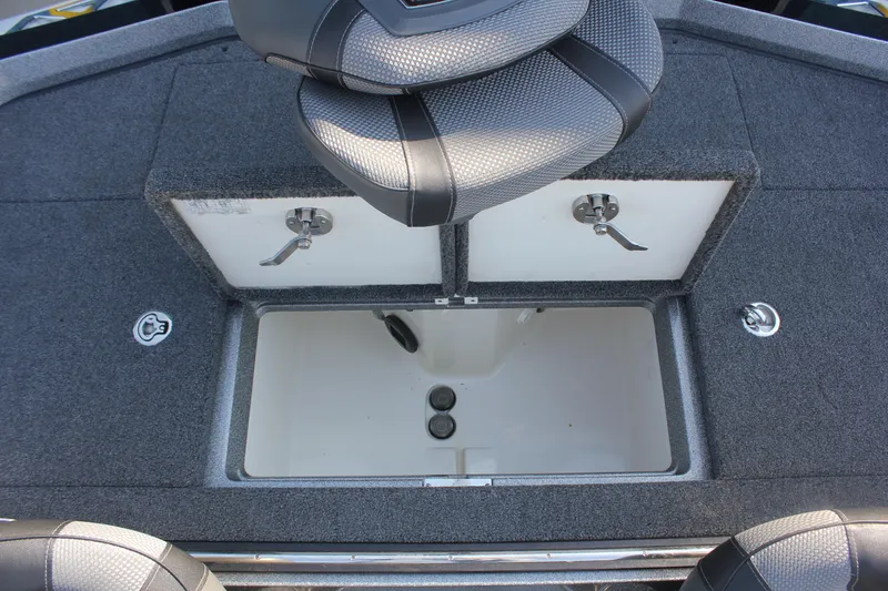 Slide: The Image of 2020 Ranger Z520L boat interior with storage compartments and seating. - 19