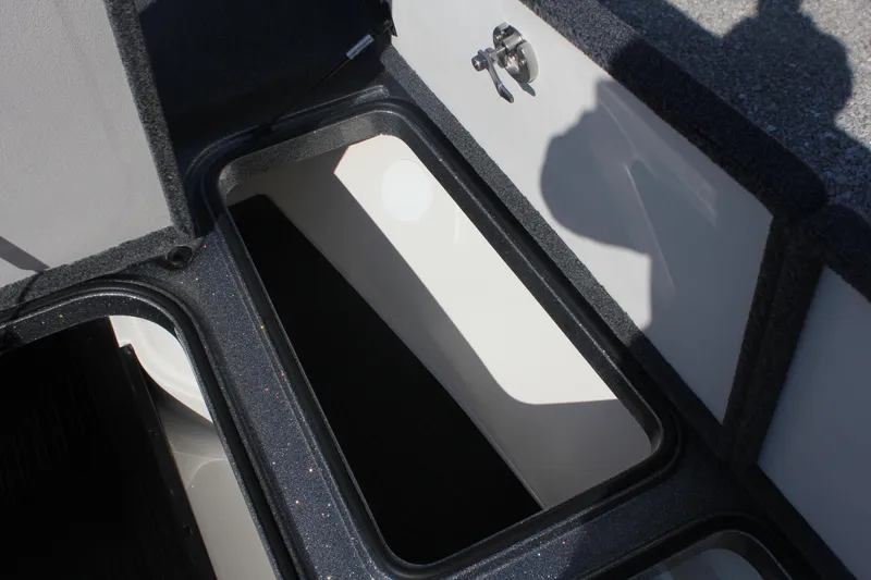 Slide: The Image of Open storage compartment on a 2020 Ranger Z520L boat. - 8