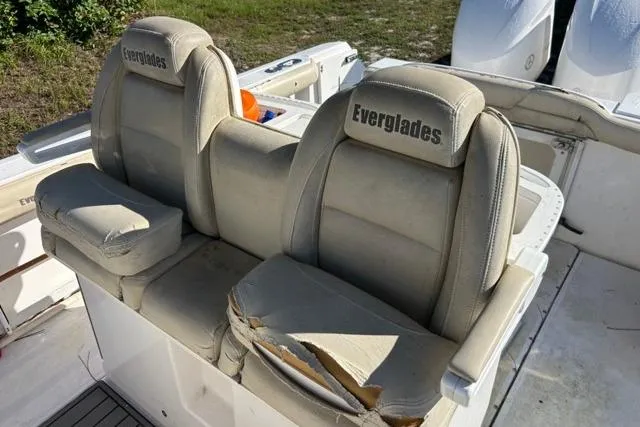 Slide: The Image of Two worn seats on a 2019 Everglades 290 Center Console boat. - 8