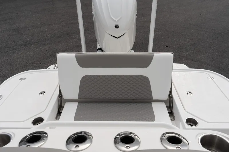 Slide: The Image of 2026 Caymas 26 HB boat seating and rod holders, featuring sleek design and modern upholstery. - 9