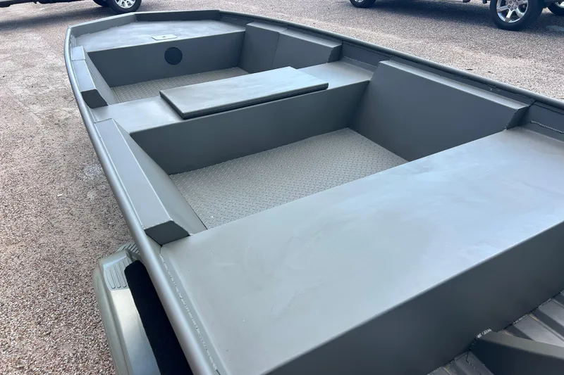 Slide: The Image of 2025 WeldBilt 1648 boat with spacious interior and durable construction. - 2