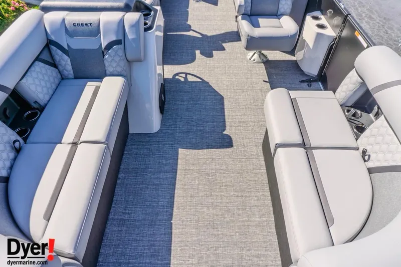 Slide: The Image of Luxurious interior of 2026 Crest Conquest 210 SLC pontoon boat with plush seating. - 9