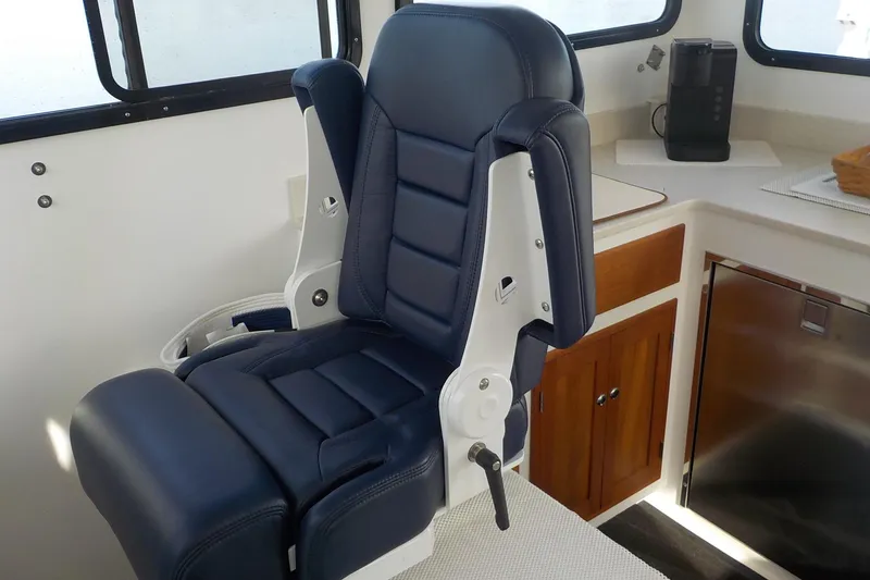 Slide: The Image of Luxurious interior of 2008 Calvin Beal Downeast boat with plush seating and modern amenities. - 22