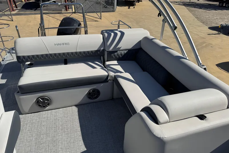 Slide: The Image of Luxurious seating on 2025 Harris Sunliner 230 pontoon boat with stylish upholstery and speakers. - 8