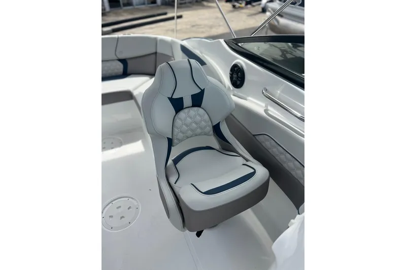 Slide: The Image of 2026 Hurricane SunDeck 2400 OB boat seat with modern design and comfortable upholstery. - 5