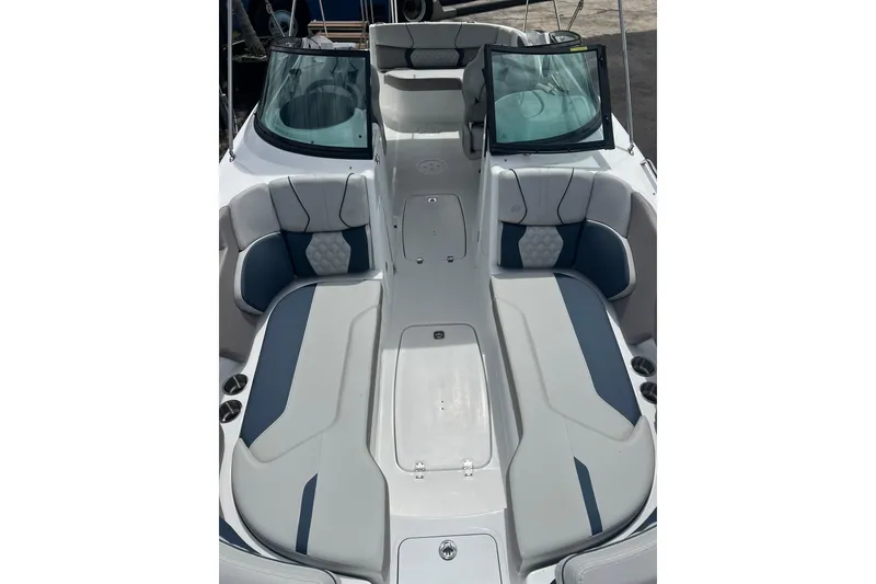 Slide: The Image of 2026 Hurricane SunDeck 2400 OB boat interior with spacious seating and modern design. - 7