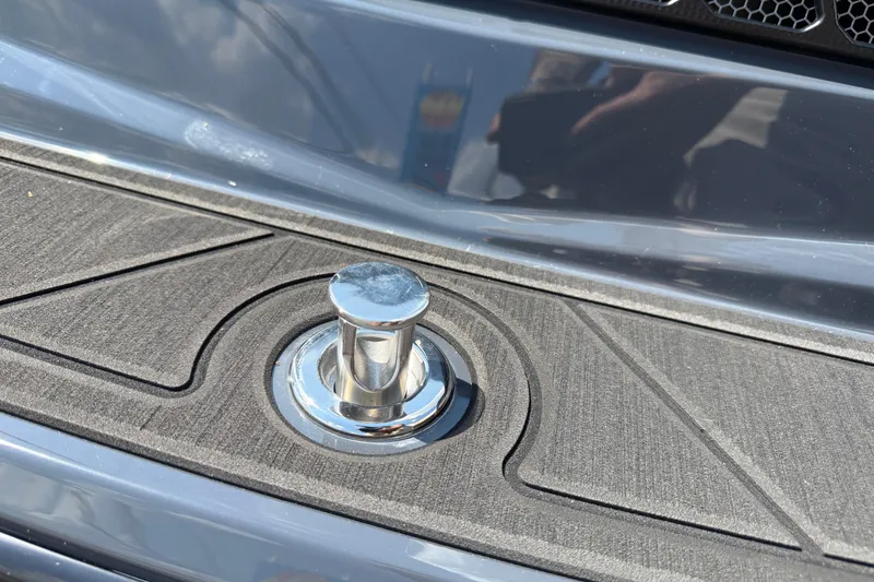 Slide: The Image of 2026 Moomba Tykon boat cleat on textured deck surface. - 13