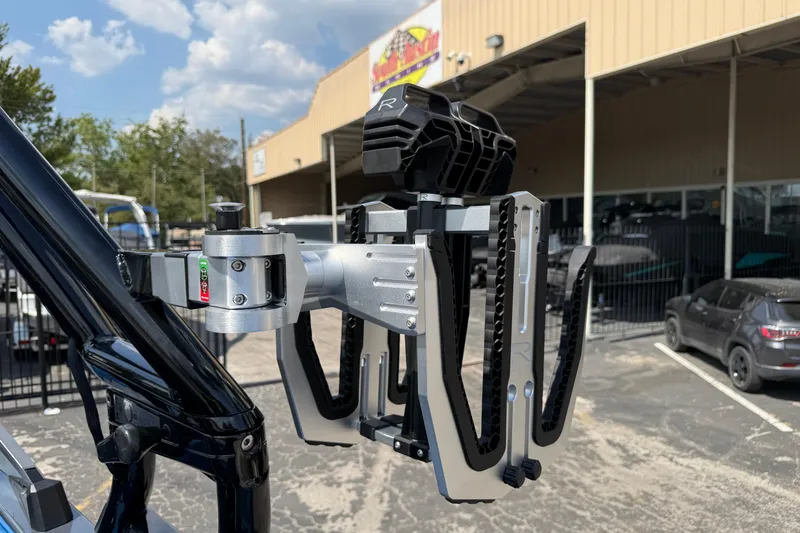 Slide: The Image of 2026 Moomba Tykon boat accessory detail in a dealership parking lot. - 26