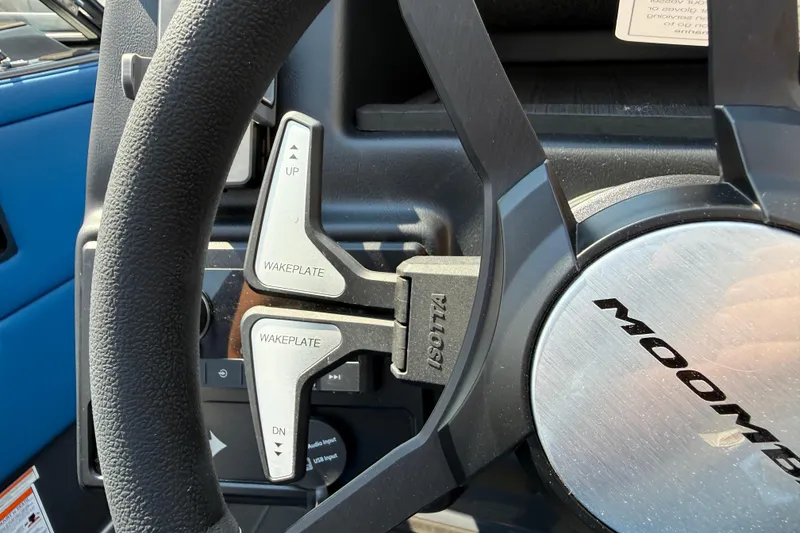 Slide: The Image of Steering wheel of 2026 Moomba Tykon with wakeplate controls. - 34