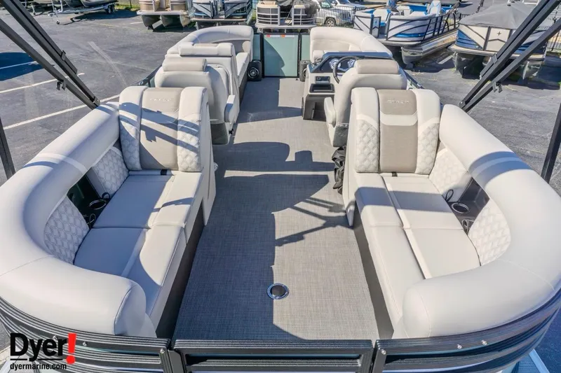 Slide: The Image of 2026 Crest Conquest 230 SLC pontoon boat with spacious seating and modern design. - 16
