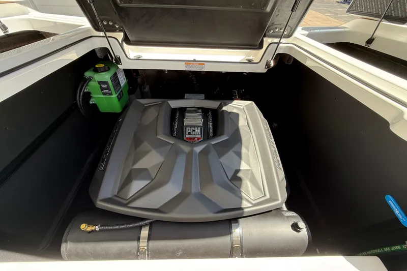 Slide: The Image of 2025 Nautique Super Air Nautique G23 engine compartment with PCM engine visible. - 17