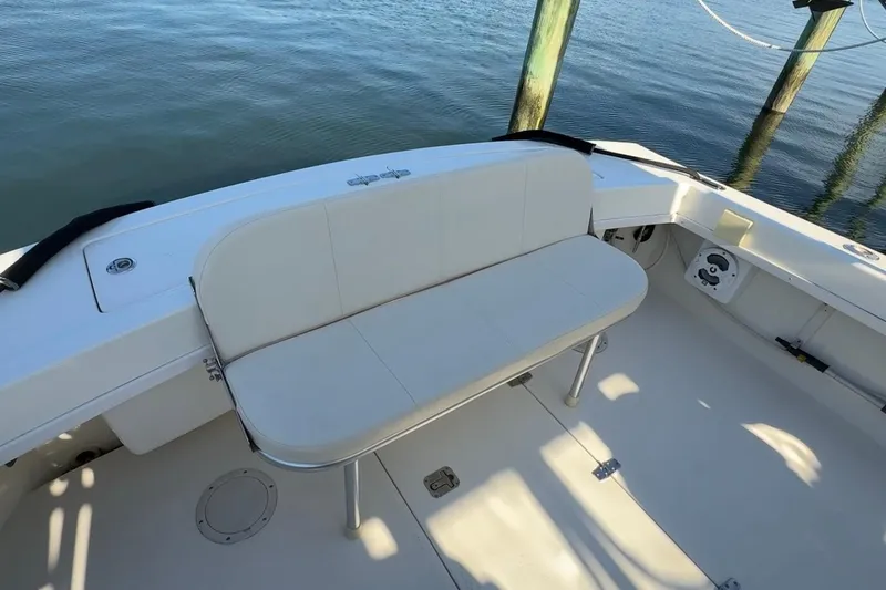 Slide: The Image of 2005 Albemarle 280 Express Fisherman boat with white seating and spacious deck. - 14
