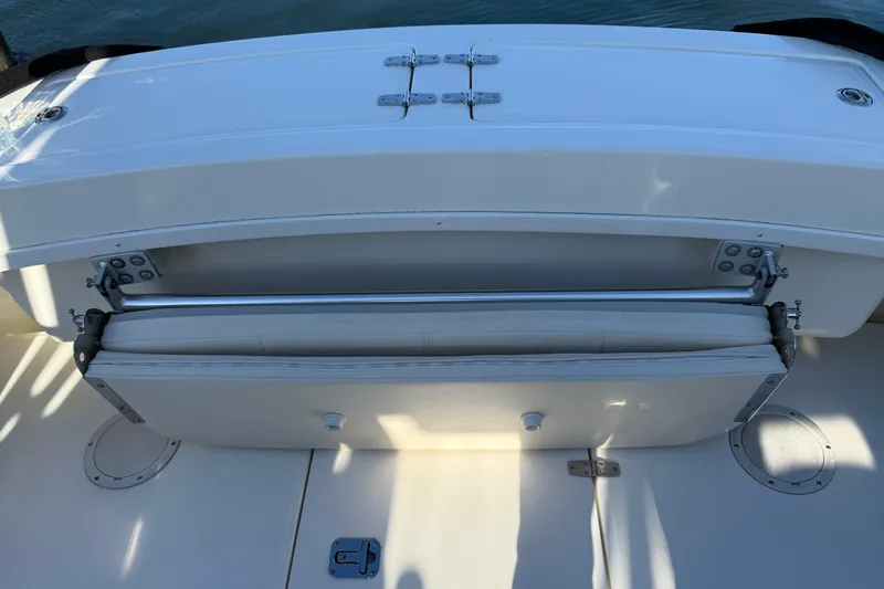 Slide: The Image of 2005 Albemarle 280 Express Fisherman boat seat and deck view. - 15