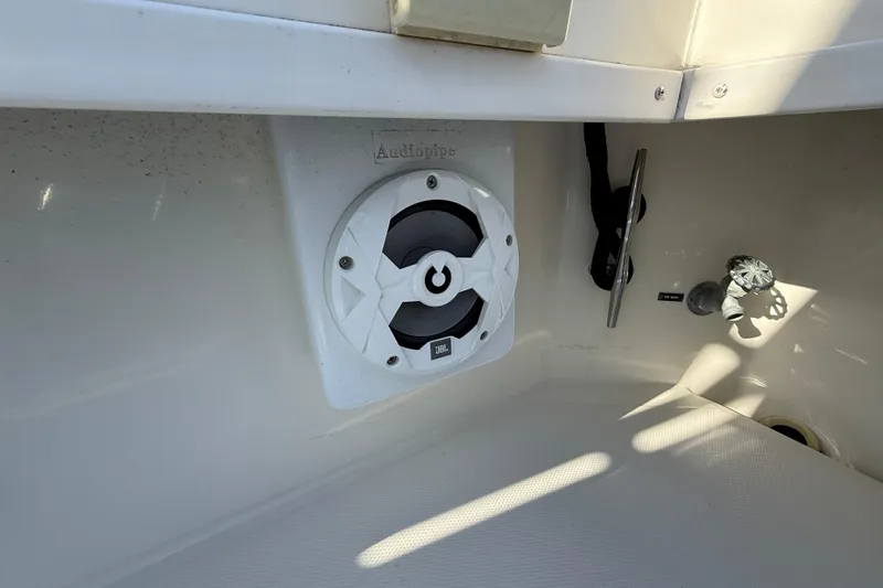 Slide: The Image of 2005 Albemarle 280 Express Fisherman boat interior with speaker and cleat. - 17