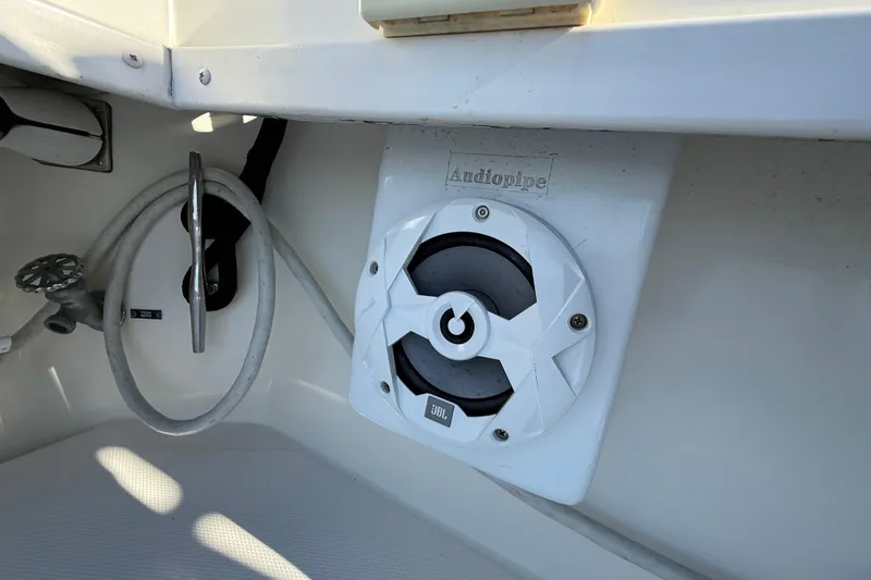Slide: The Image of 2005 Albemarle 280 Express Fisherman boat interior with Audiopipe JBL speaker. - 19