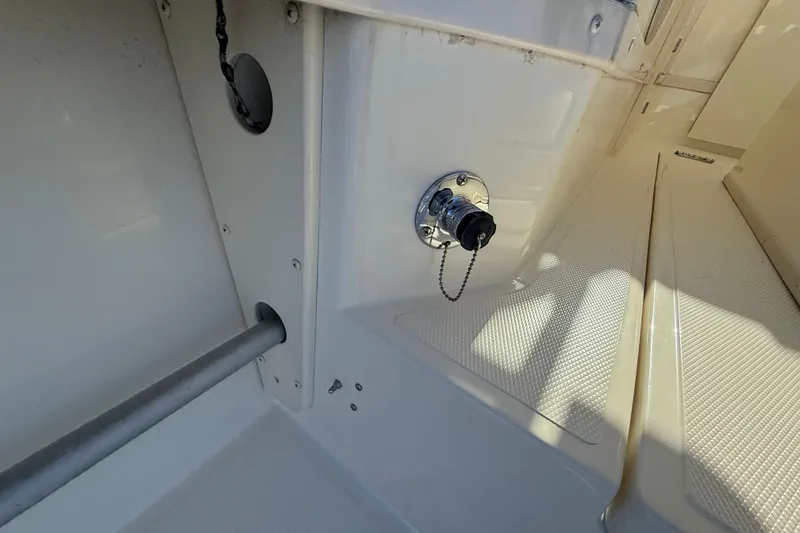 Slide: The Image of 2005 Albemarle 280 Express Fisherman boat interior detail with metal fittings. - 20