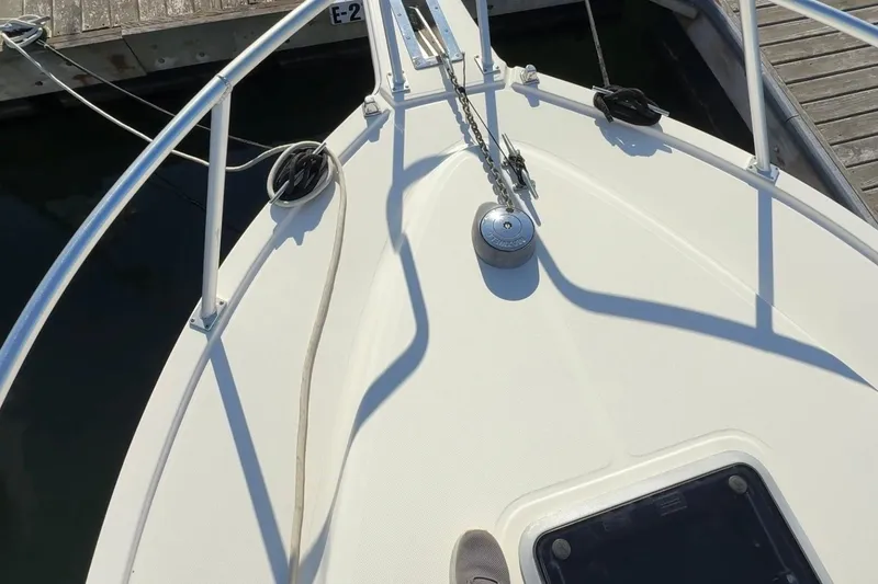 Slide: The Image of 2005 Albemarle 280 Express Fisherman boat deck with anchor and railing. - 23