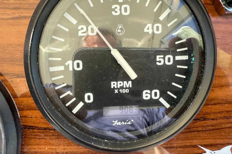 Slide: The Image of Close-up of a 2005 Albemarle 280 Express Fisherman RPM gauge. - 32