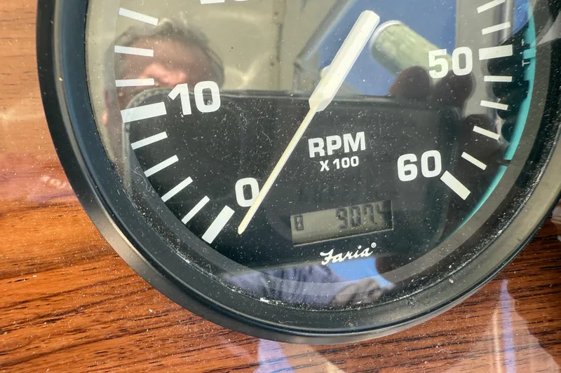 Slide: The Image of Close-up of a 2005 Albemarle 280 Express Fisherman RPM gauge showing 900 hours. - 33