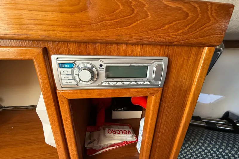 Slide: The Image of 2005 Albemarle 280 Express Fisherman cabin with Clarion stereo system in wooden panel. - 39