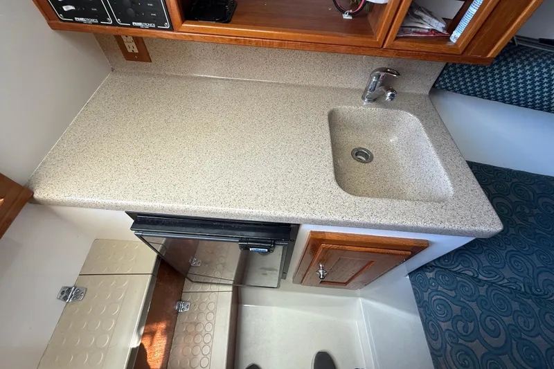 Slide: The Image of 2005 Albemarle 280 Express Fisherman interior with sink and countertop. - 43