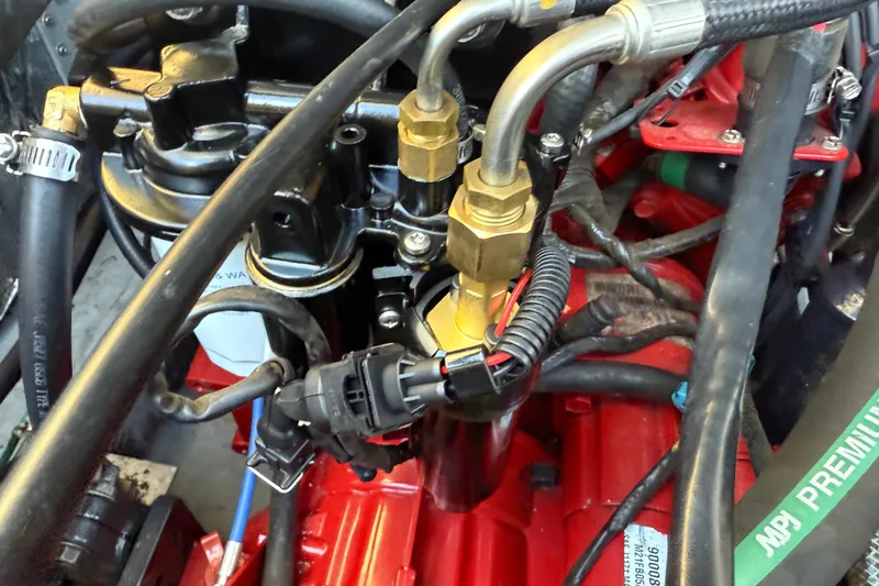 Slide: The Image of Close-up of 2005 Albemarle 280 Express Fisherman engine components and wiring. - 54