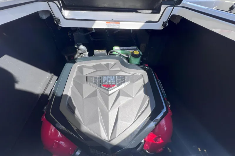 Slide: The Image of 2025 Nautique Super Air Nautique G21 engine compartment with PCM engine cover. - 15