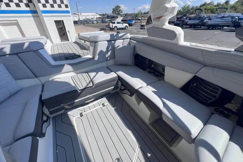 Slide: The Image of 2025 Nautique Super Air Nautique G21 interior with luxurious seating and modern design. - 9