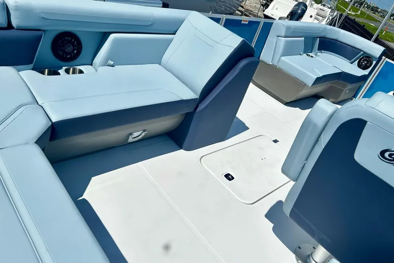 Slide: The Image of 2025 Hurricane FunDeck 2260 RE OB interior with spacious seating and modern design. - 4