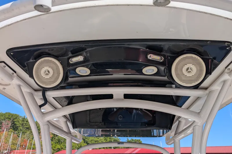 Slide: The Image of 2018 Wellcraft 242 Fisherman boat speakers and lights on T-top. - 9