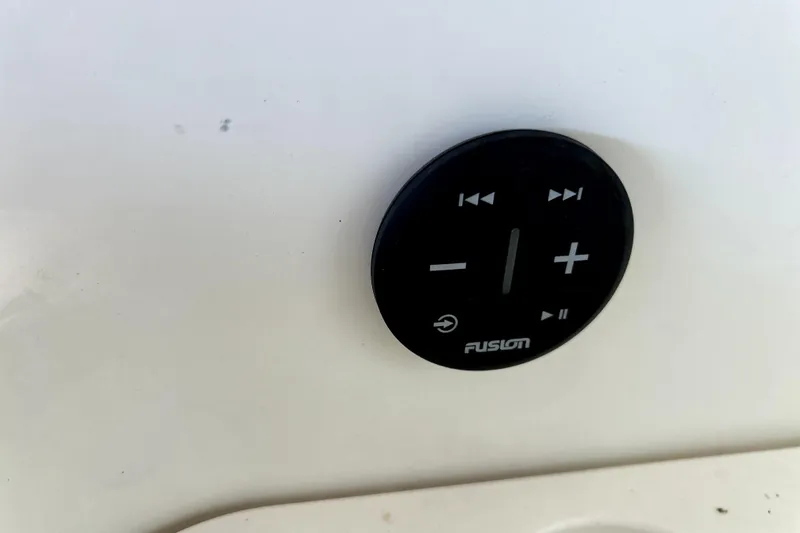 Slide: The Image of Control panel on a 2020 Boston Whaler 170 Montauk boat, featuring Fusion audio controls. - 15