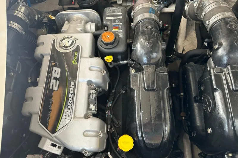Slide: The Image of Engine of 2014 Sea Ray 350 Sundancer boat, featuring MerCruiser 8.2 Horizon. - 56