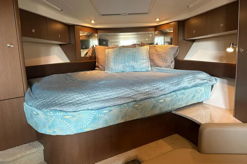 Slide: The Image of Luxurious cabin interior of 2014 Sea Ray 350 Sundancer yacht with cozy bedding. - 65