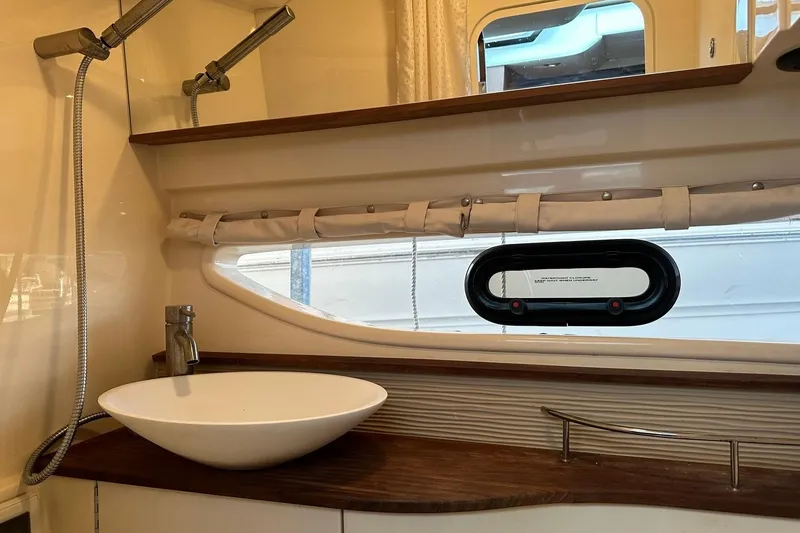 Slide: The Image of Luxurious bathroom interior of 2014 Sea Ray 350 Sundancer yacht with modern fixtures. - 70