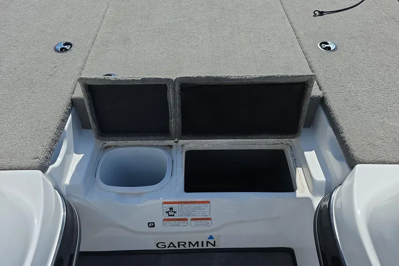 Slide: The Image of 2011 Nitro Z-8 boat storage compartments with Garmin equipment. - 11