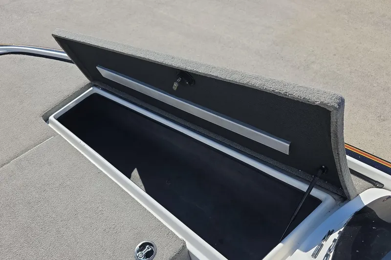 Slide: The Image of Open storage compartment on 2011 Nitro Z-8 boat, showcasing interior space. - 13