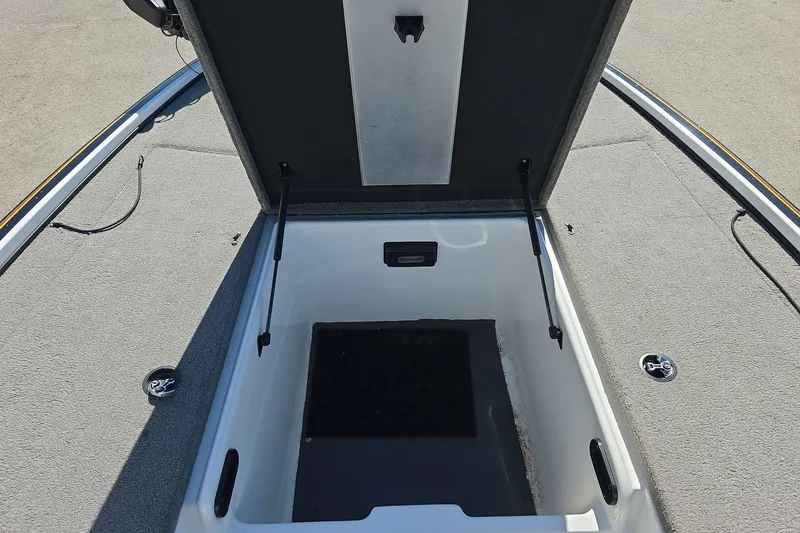 Slide: The Image of Open storage compartment on a 2011 Nitro Z-8 boat, showcasing interior space. - 7