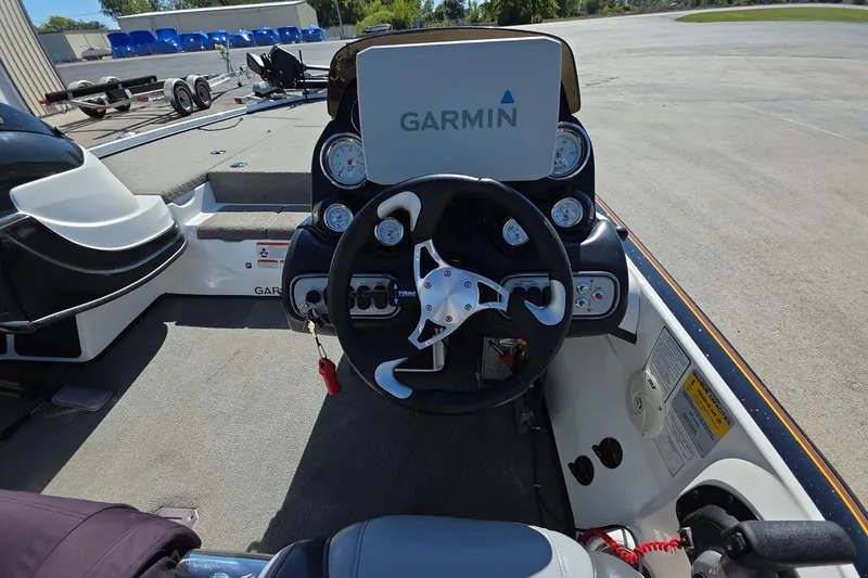 Slide: The Image of Steering console of a 2011 Nitro Z-8 boat with Garmin navigation system. - 9