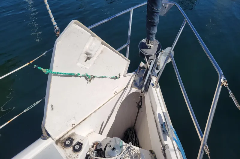 Slide: The Image of Bow of 2001 Hunter Passage 420 sailboat with anchor and ropes. - 3