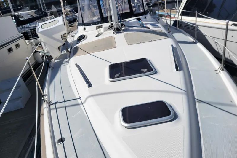 Slide: The Image of 2001 Hunter Passage 420 sailboat deck view at marina. - 4