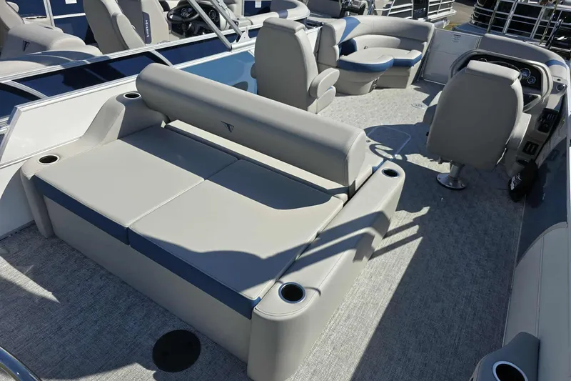 Slide: The Image of 2026 Trifecta 25LE pontoon boat interior with plush seating and modern design. - 8